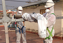 Retirada bajantes fibrocemento - Ensacado individual de tubos